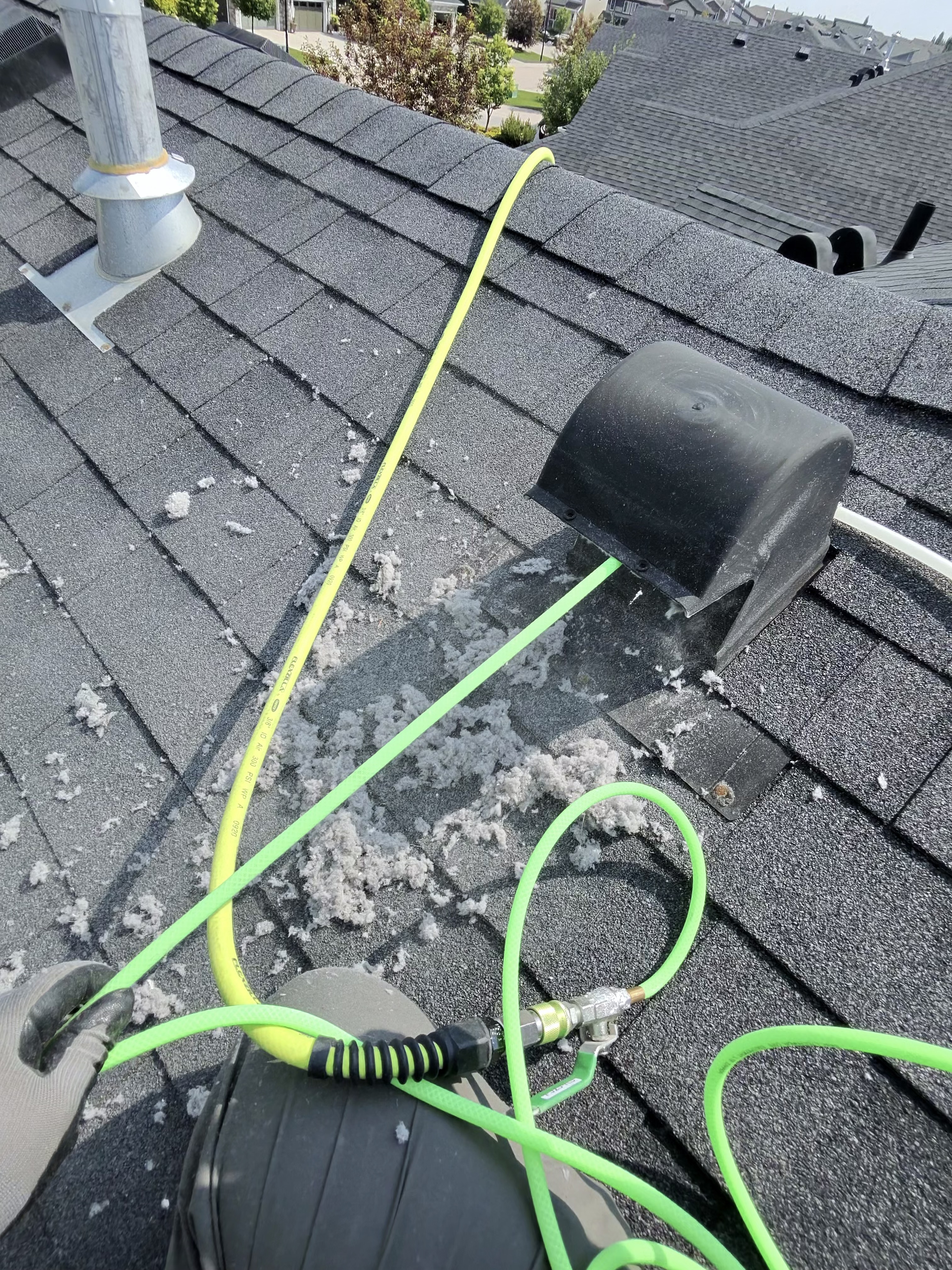 Compacted lint removed from a residential dryer vent run
