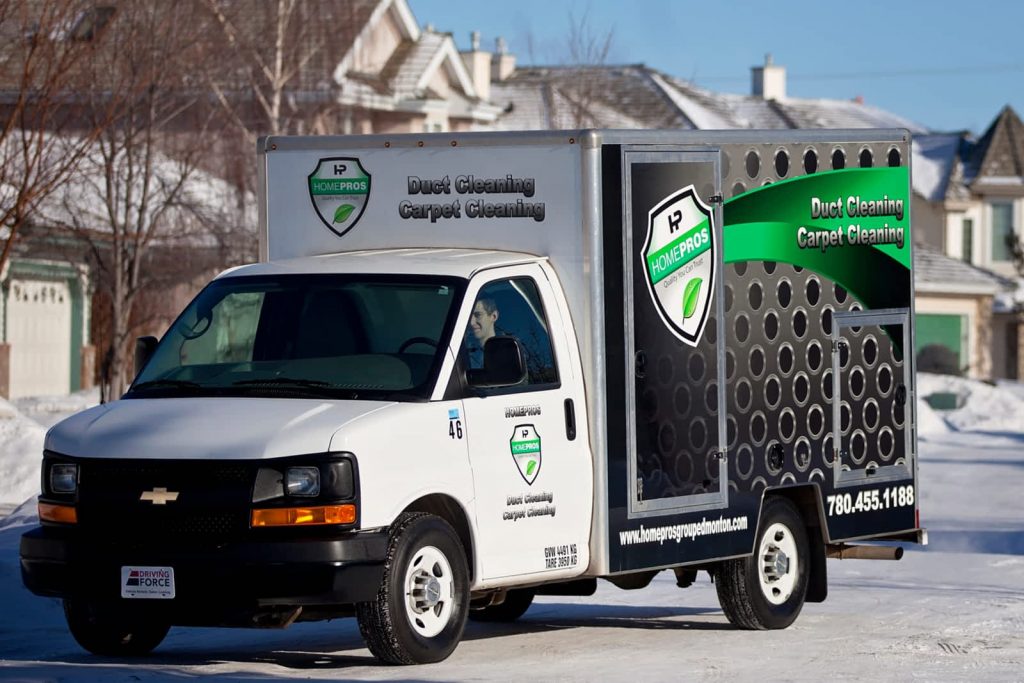Home Pros Group furnace cleaning truck and technician in Spruce Grove